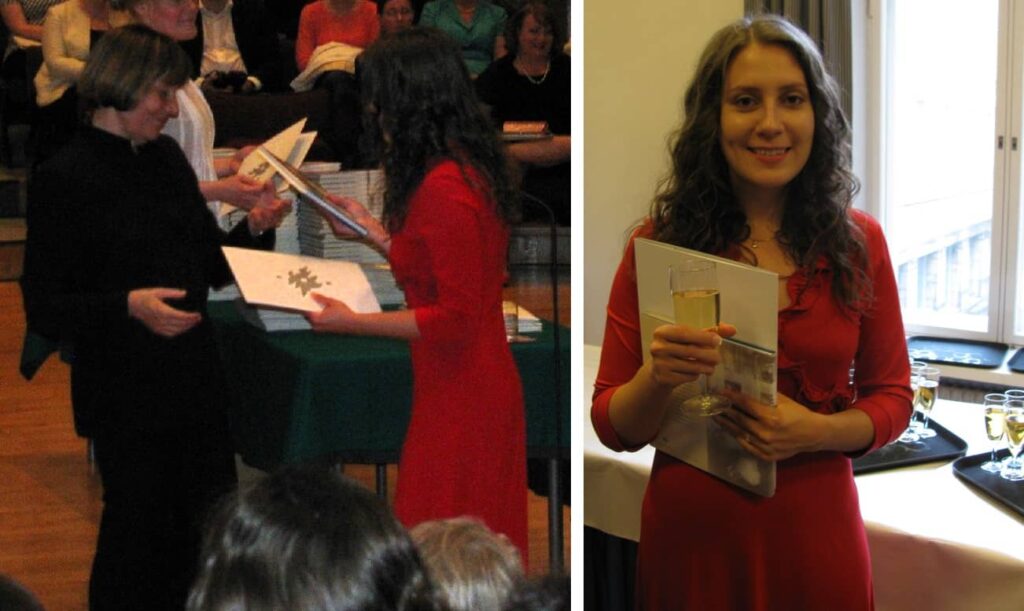 distributing diplomas to graduates at master's graduation ceremony