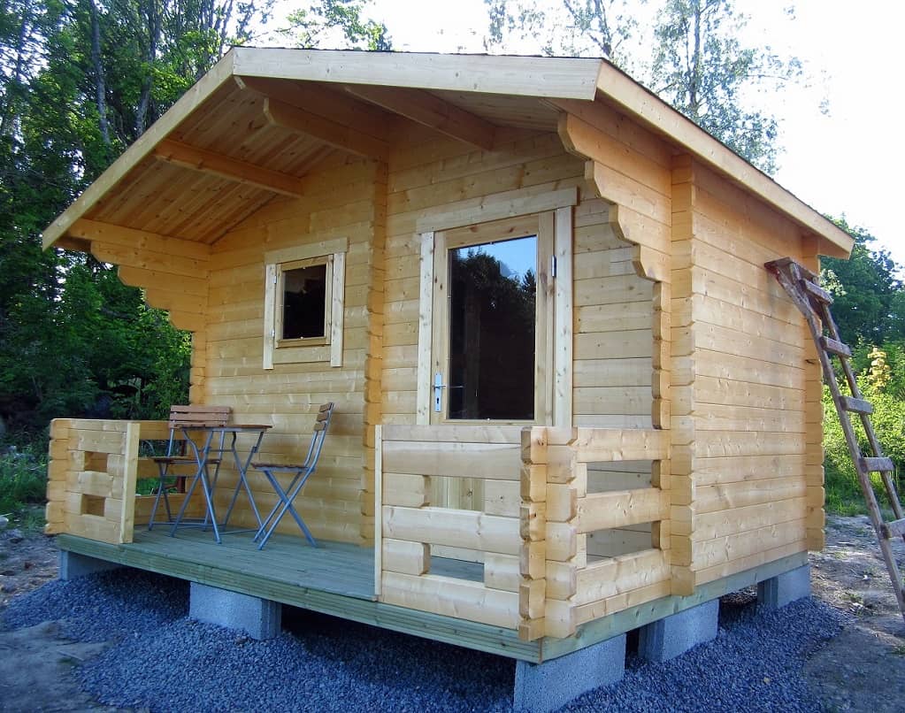 outdoor sauna with dressing room and deck