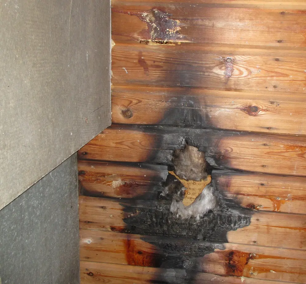 burnt outdoor sauna wall
