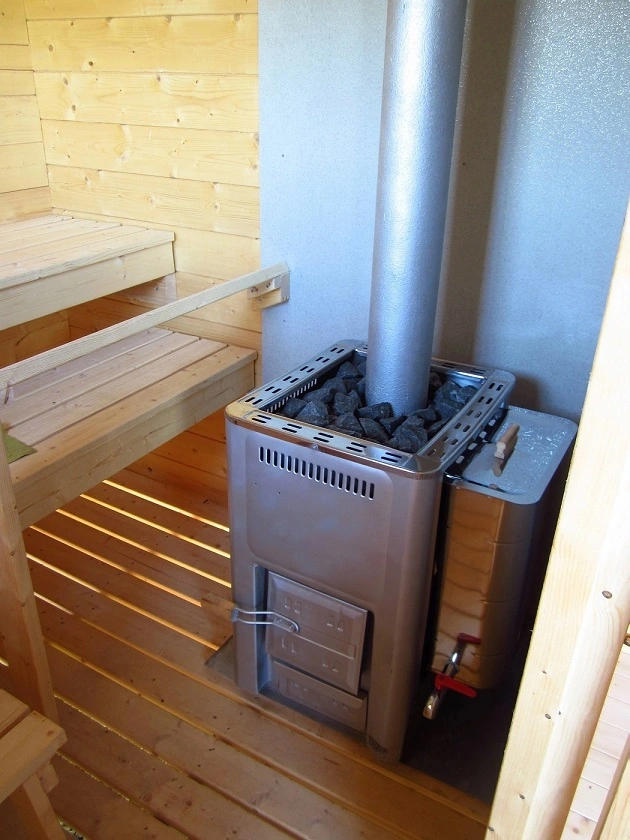 wood stove with chimney and sauna benches