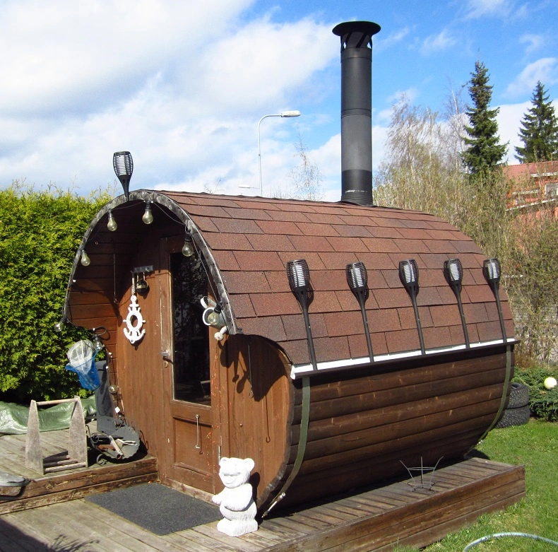 barrel sauna with long chimney