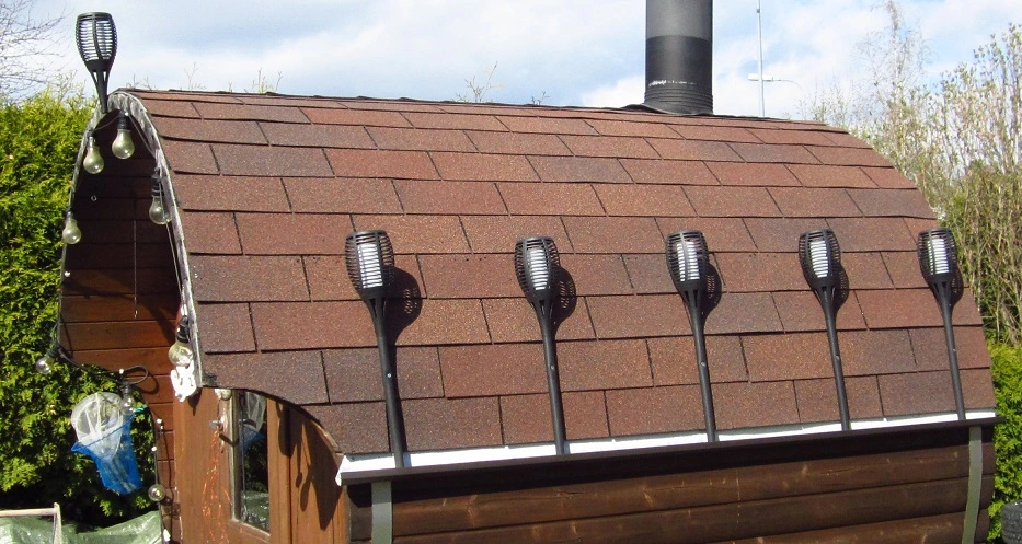 sauna roof built with asphalt shingles