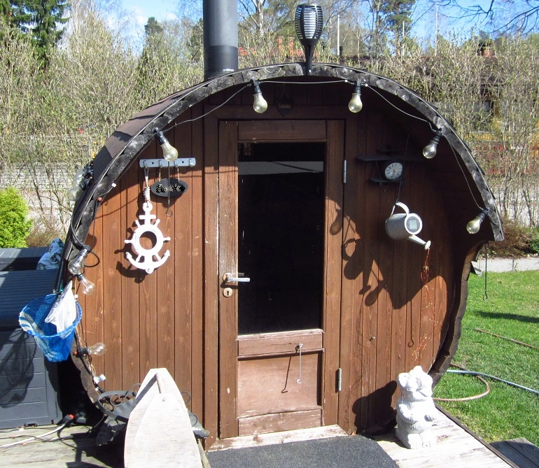 barrel sauna on a patio