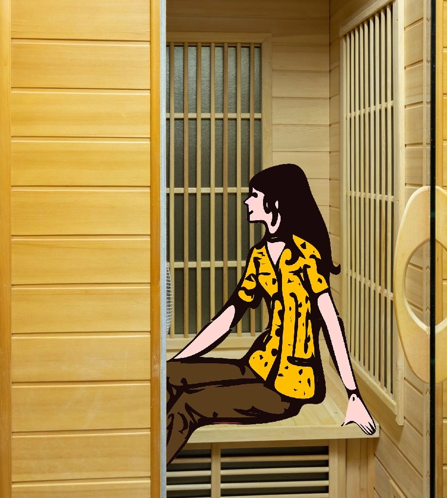woman sitting in an infrared sauna wearing a yellow shirt