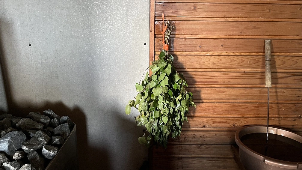 sauna whisk in an outdoor Finnish sauna