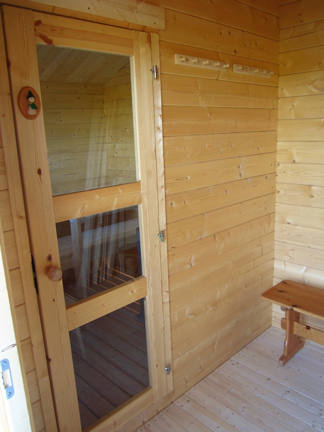outdoor sauna entrance and dressing room