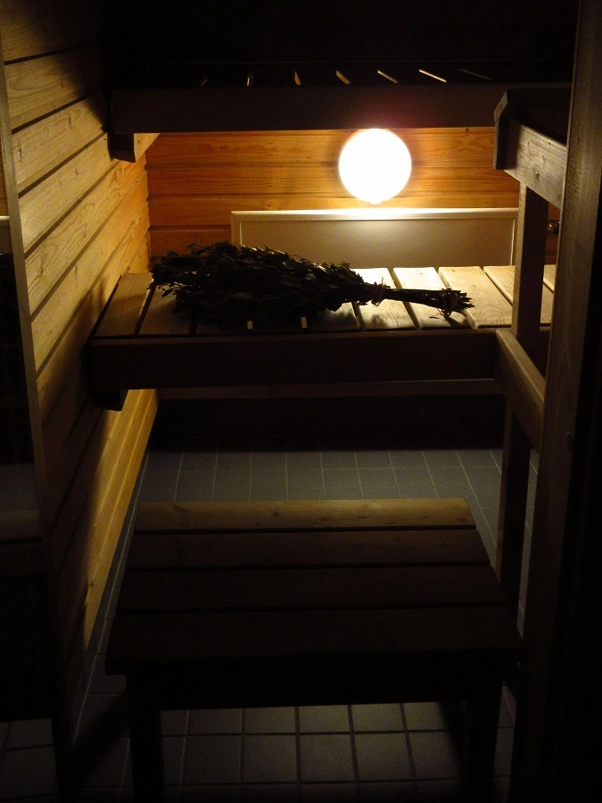 clean sauna with sauna whisk and light