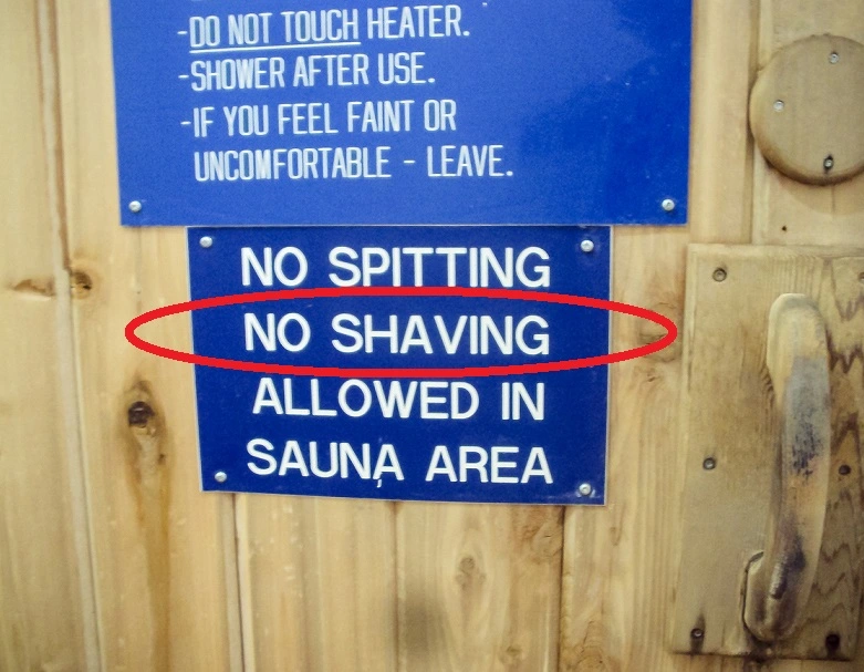 sauna rules on sauna room door
