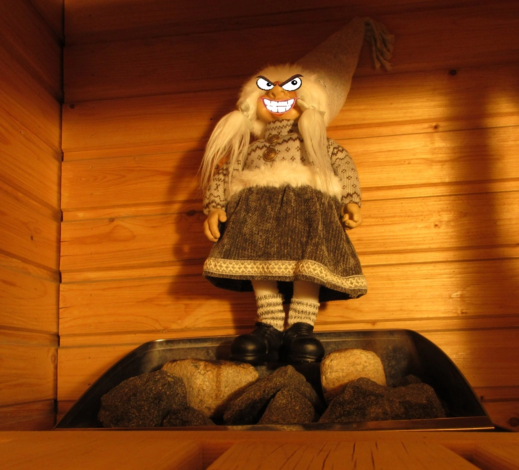 angry sauna elf standing on sauna rocks