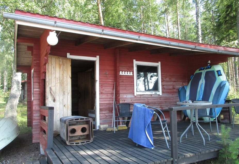 red outdoor sauna during summer