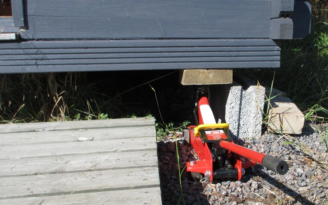 sauna floor being jacked up