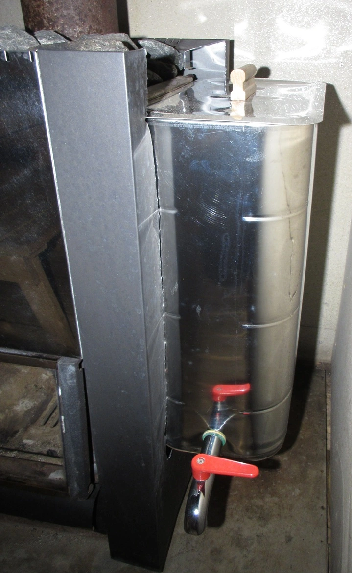 sauna water tank shown in its slot
