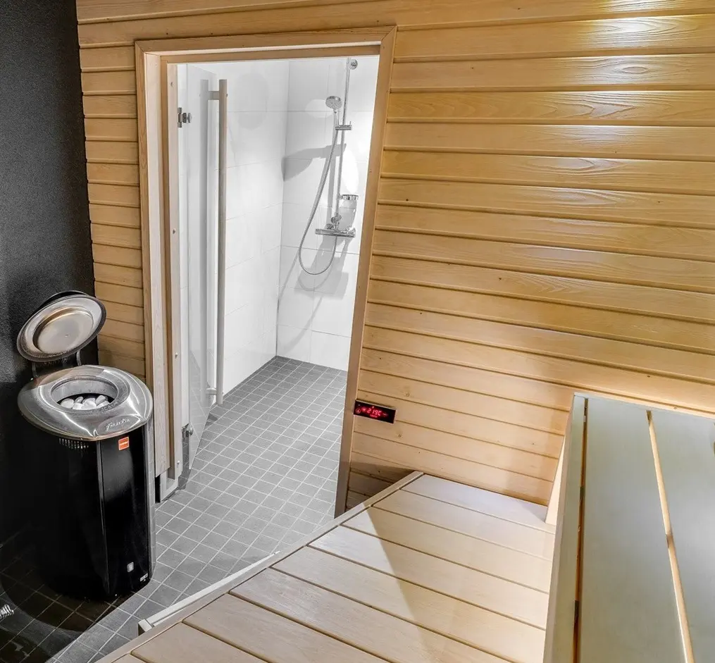 black Harvia Forte in a sauna room